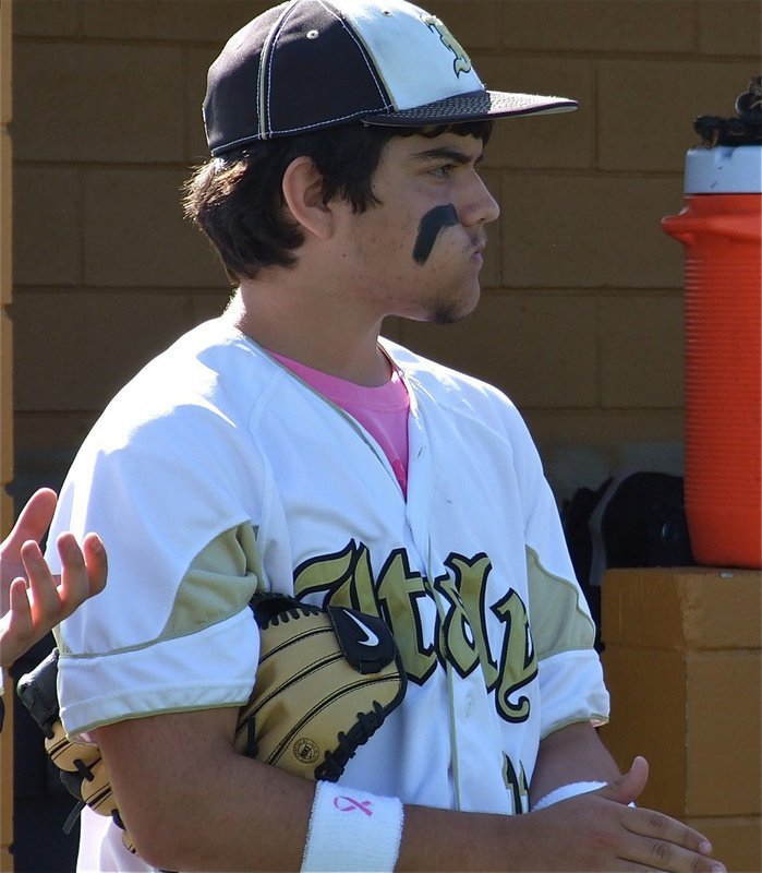 Image: With a mouth full of sunflower seeds, Tyler Anderson offers applause as the Hubbard lineup is introduced.