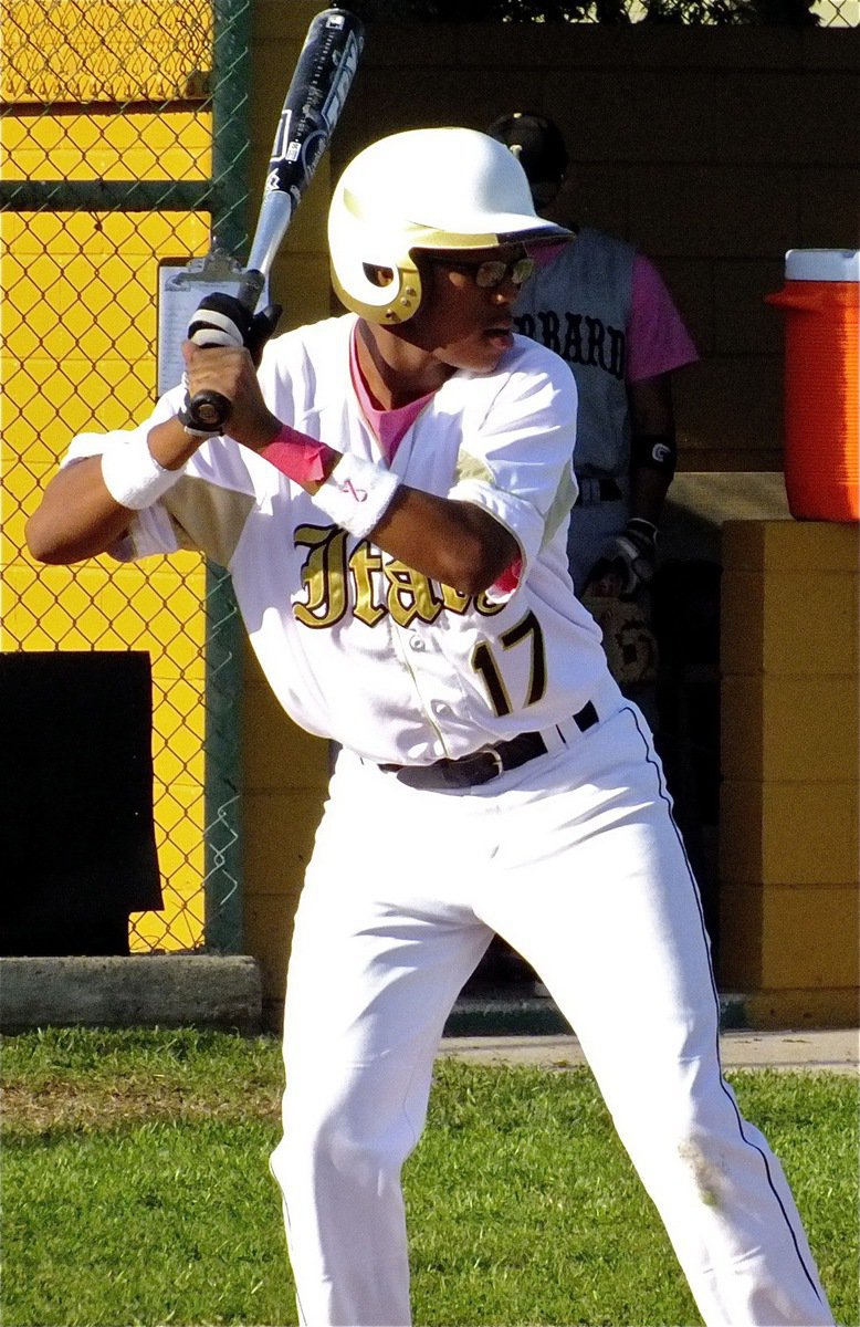 Image: John Hughes(17) battles at he plate for the JV Gladiators.