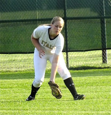 Image: Lady Gladiator center fielder, Madison Washington(2) fields a grounder.