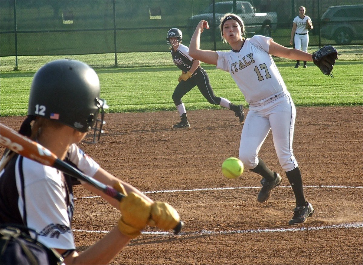 Image: Lady Gladiator senior pitcher, Megan Richards(17) brings the heat against Grandview.