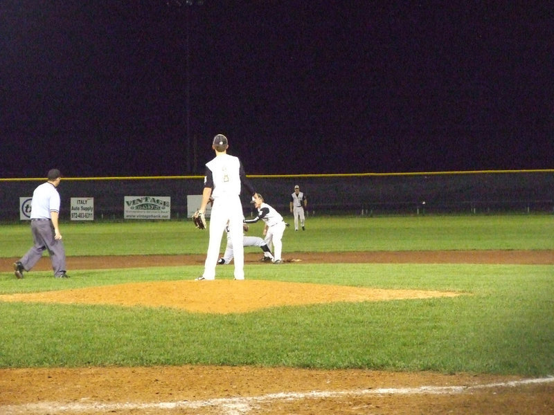 Image: Caden Jacinto gets a Zebra out at second.