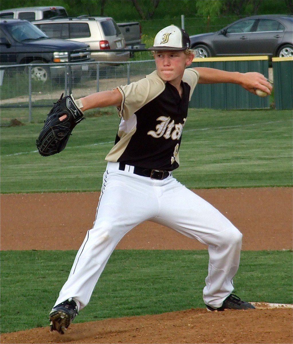Image: Italy’s, Cody Boyd(9). eyes the mitt from the mound in Maypearl.