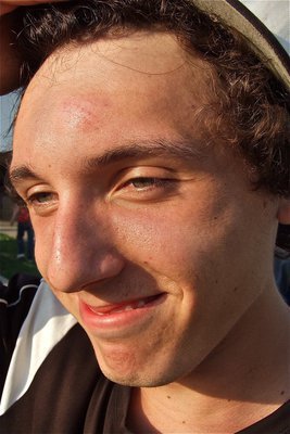 Image: Ouch! JV Gladiator, Chace McGinnis, takes a ball to the forehead while covering a grounder at his shortstop position but did not miss the next play.