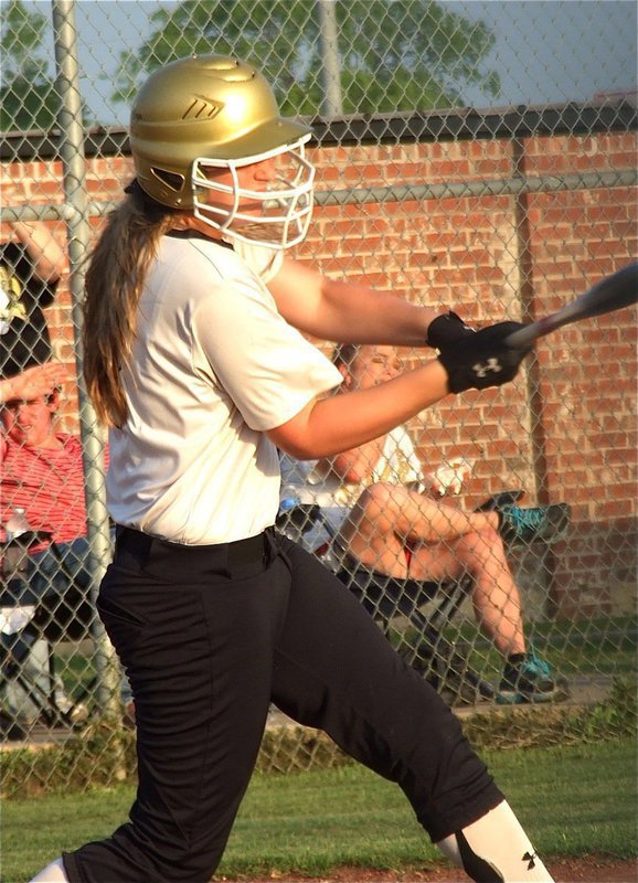 Image: Lady Gladiator, Madison Washington, drives the ball thru Maypearl’s defense.