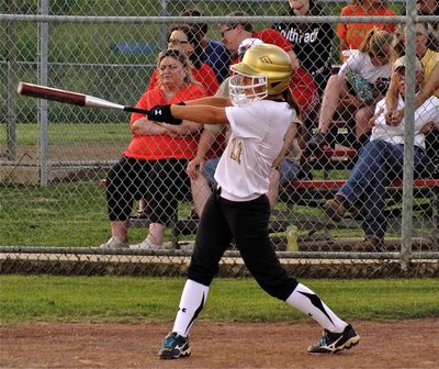 Image: Lady Gladiator, Bailey Eubank(11), takes a practice swing before stepping into the batter’s box.