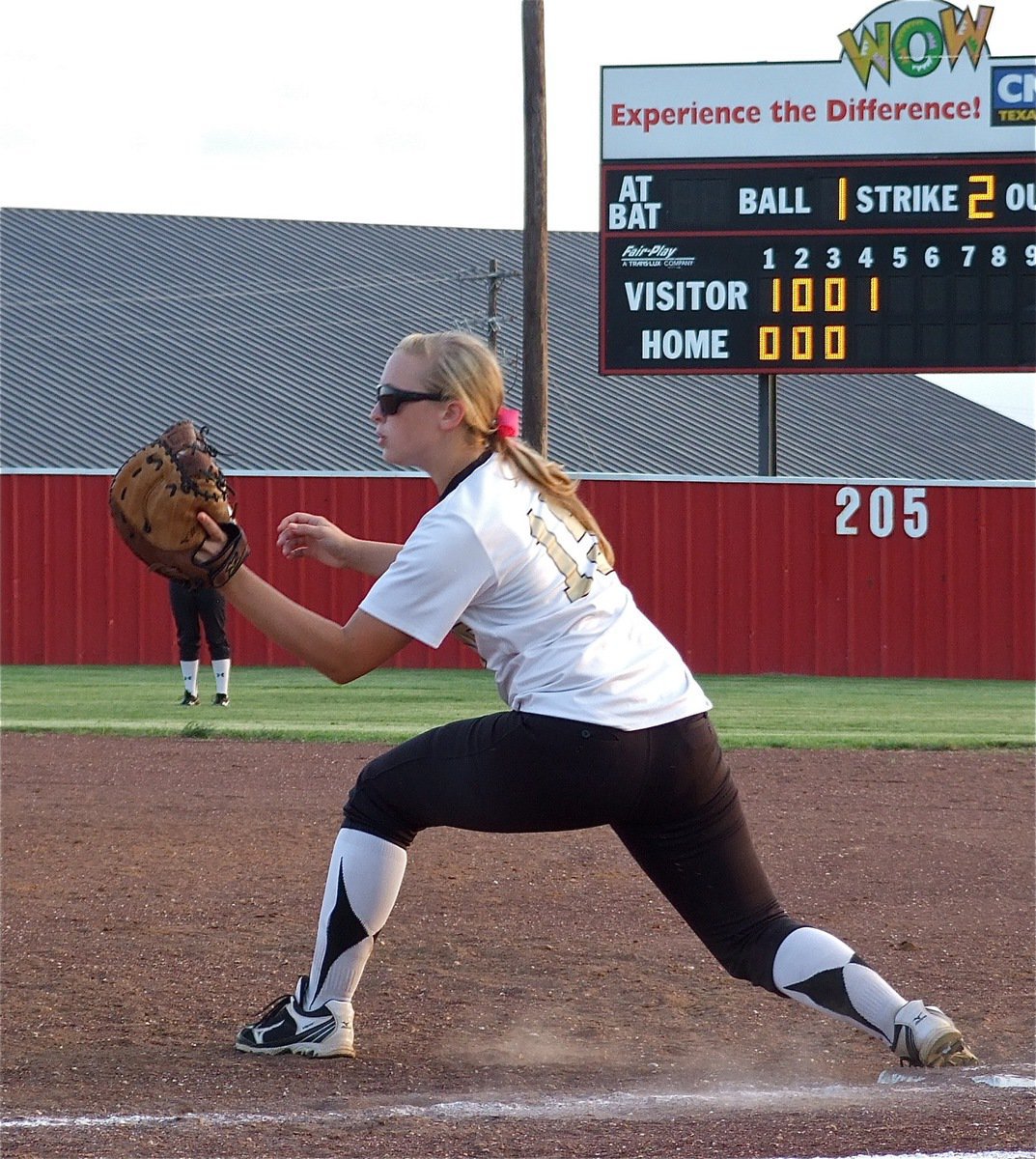 Image: Italy’s, Jaclynn Lewis(15), catches a ball thrown to first base.