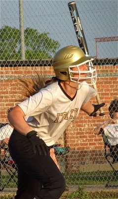 Image: Madison Washington, hits a single into the Lady Panther outfield.