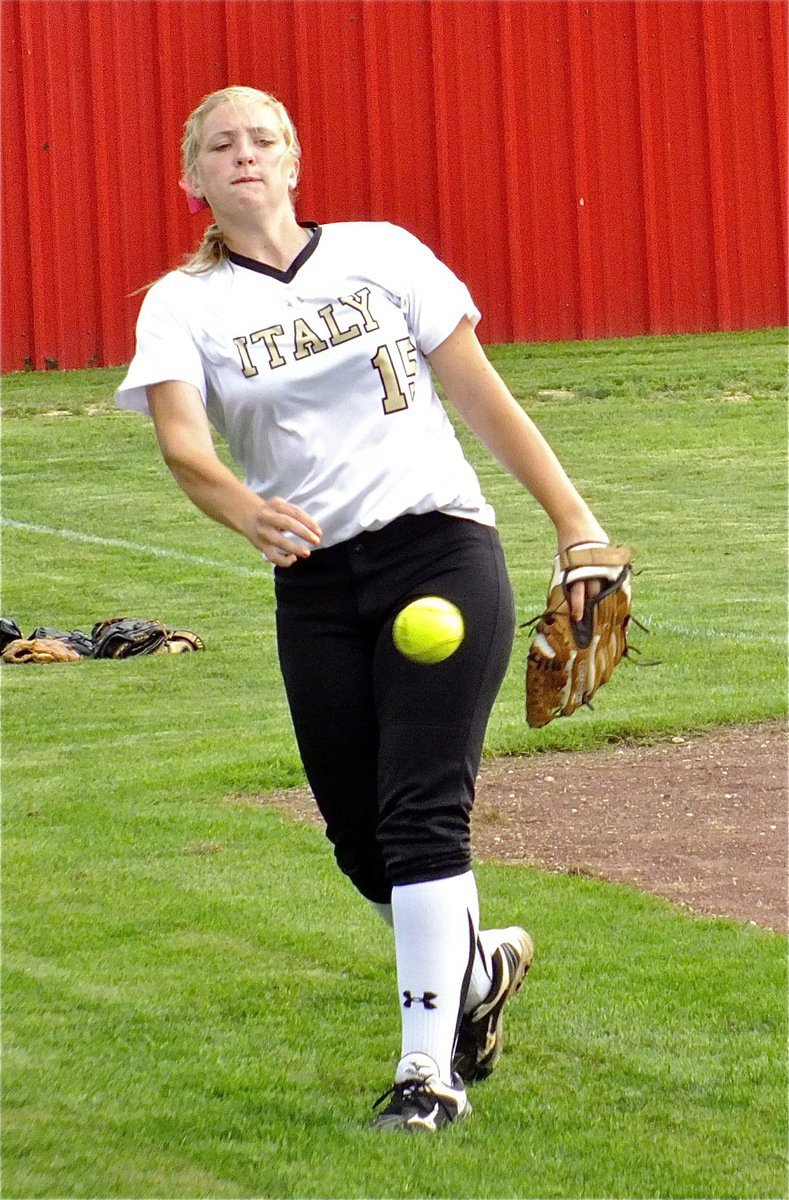 Image: Italy’s, Jaclynn Lewis, gets her arm ready for duty.