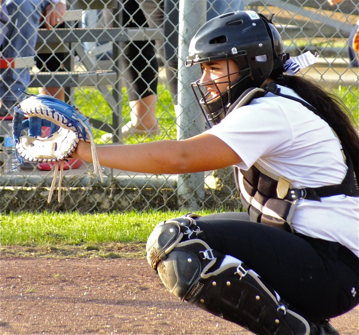Image: Catcher, Alyssa Richards, keeps her pitchers in line.