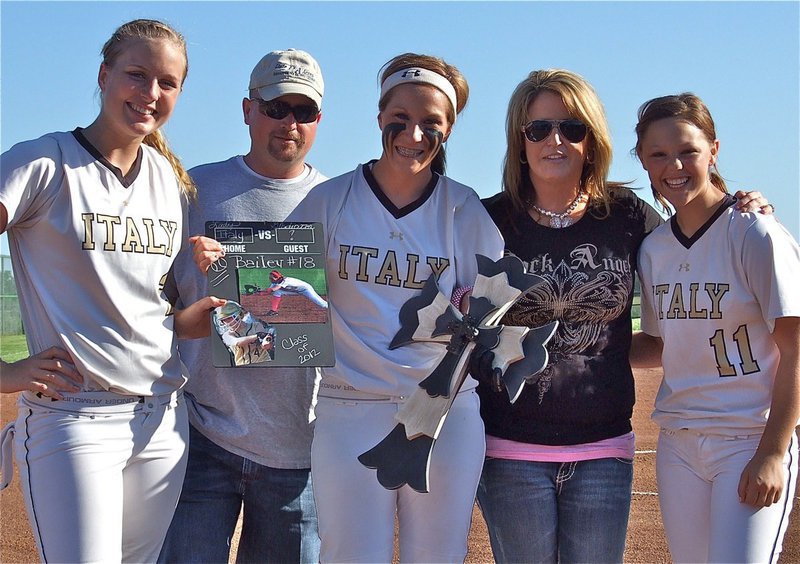 Image: Senior Lady Gladiator, Bailey Bumpus(18) [Center], is honored before her final home game with her parents, Larry Bumpus, and, Deonna Padilla, and teammates, Madison Washington(2), and, Bailey Eubank(11).