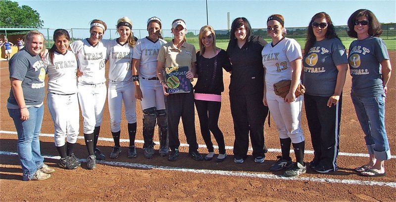 Image: Lady Gladiator head coach, Jennifer Reeves [Gold shirt], is honored by 2010 Lady Gladiator team members and coaches before Italy’s final home game of the 2012 season, in what is the final year for, Coach Reeves, as an Italy ISD faculty member and coach.