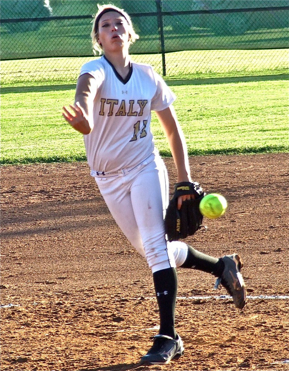 Image: Megan Richards(17), delivers a wicked pitch.