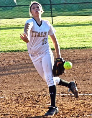 Image: Megan Richards(17), delivers a wicked pitch.