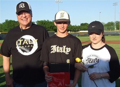 Image: Senior Gladiator, Ross Stiles(1), is honored during, “Senior Day,” and is escorted by his parents, Mark &amp; Clover Stiles.