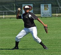 Image: JV Gladiator, John “Squirt” Hughes,  gets going in warmups.