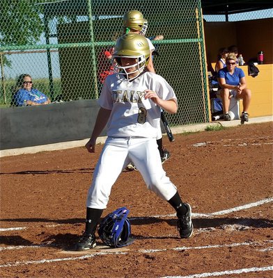 Image: Scoring another run for Italy is Tara Wallis(8).