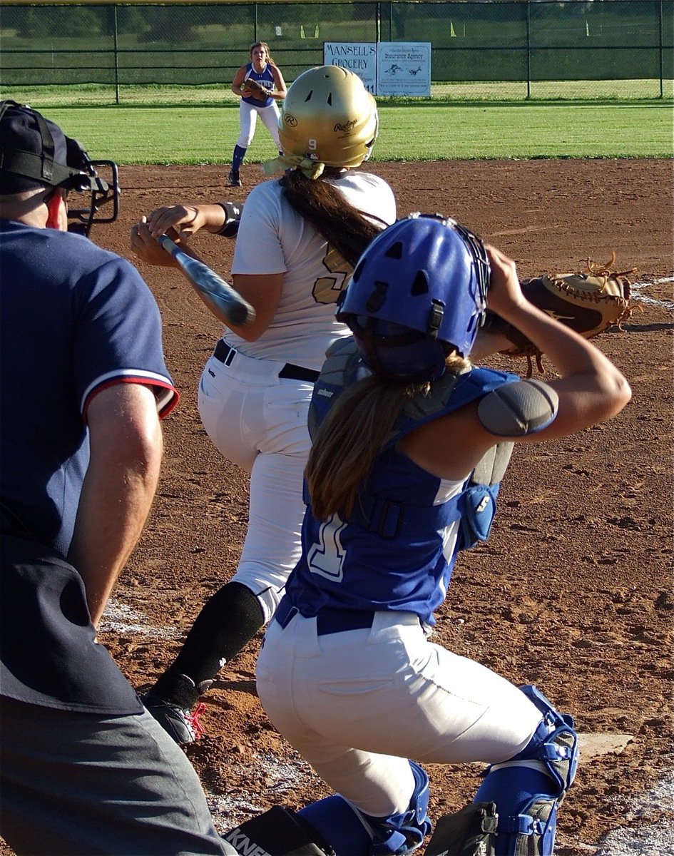 Image: Alyssa Richards(9) connects and Whitney’s defense scrambles.