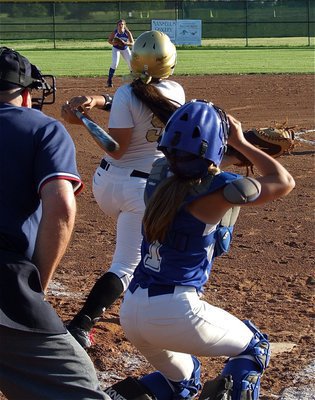 Image: Alyssa Richards(9) connects and Whitney’s defense scrambles.