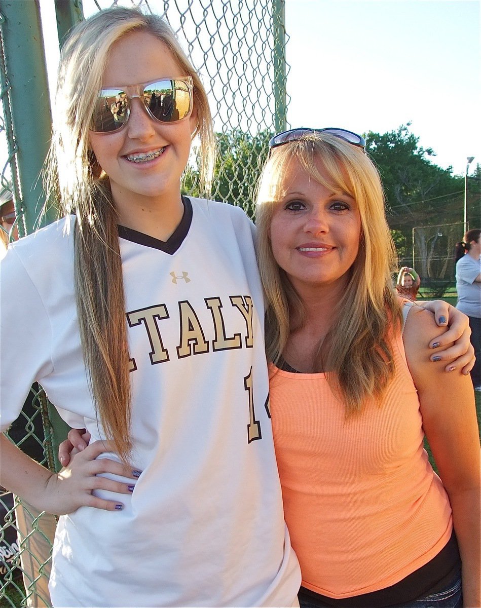 Image: Lady Gladiator freshman, Kelsey Nelson(14) gives mom, Kimberly Nelson, a hug.