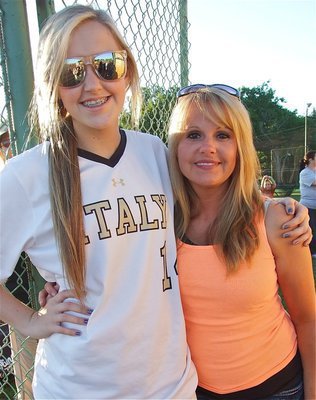 Image: Lady Gladiator freshman, Kelsey Nelson(14) gives mom, Kimberly Nelson, a hug.