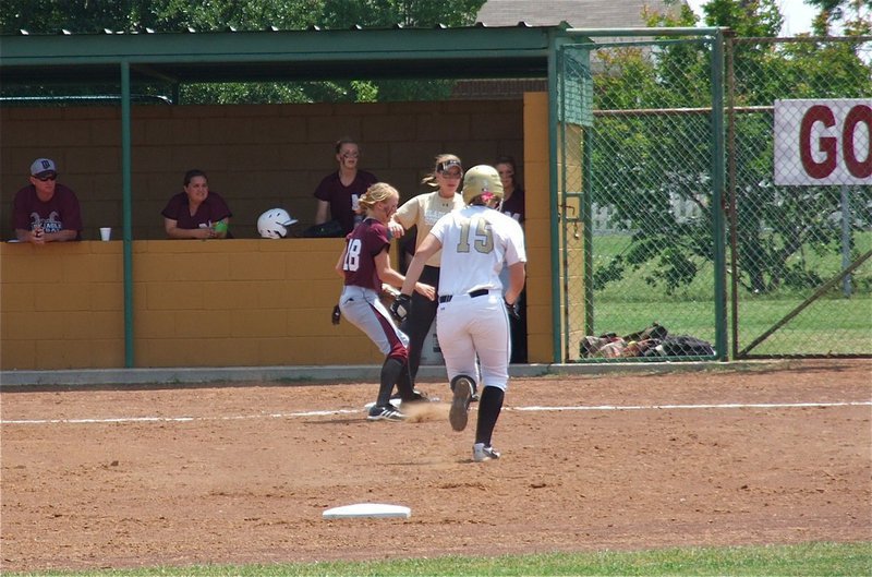 Image: Lady Gladiator, Jaclynn Lewis(15), hustles to third base and then heads home as requested by Italy’s head coach, Jennifer Reeves, during the second game of the area championship game against Mildred.
