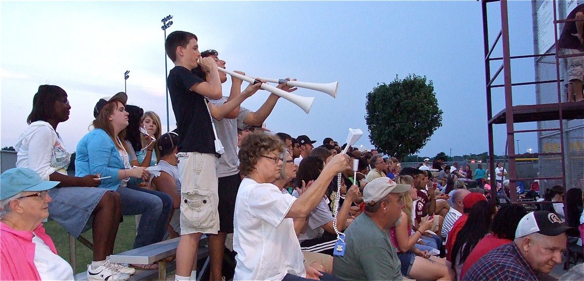 Image: Lady Gladiator fans,Ty Windam and Chace McGinnis lead the cheers in Mildred.