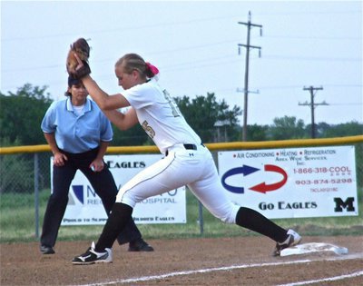 Image: Jaclynn Lewis(15) makes the grab for another Italy out at first base.