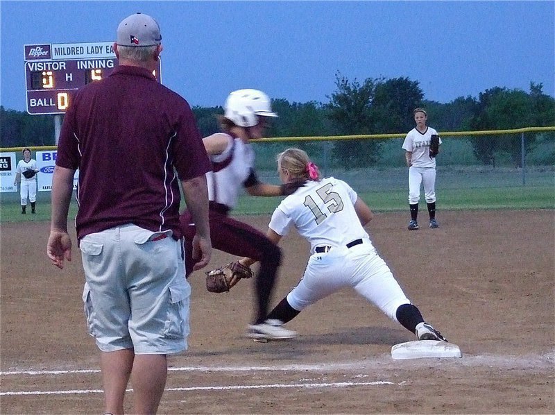 Image: Stretching out for the catch is Jaclynn Lewis(15) for another Italy out.
