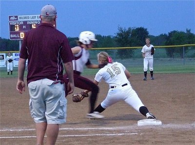 Image: Stretching out for the catch is Jaclynn Lewis(15) for another Italy out.