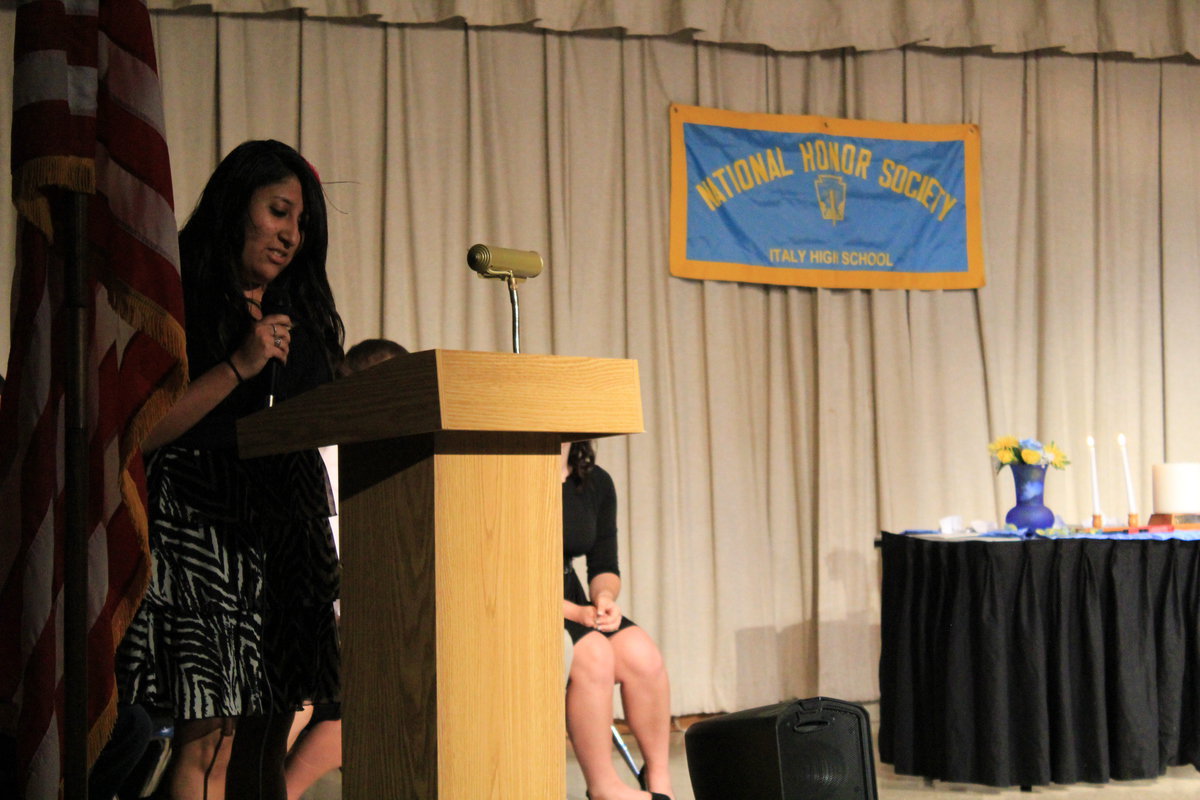 Image: Susana Rodriguez (senior) reads the NHS “Character” pledge.