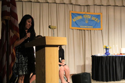 Image: Susana Rodriguez (senior) reads the NHS “Character” pledge.