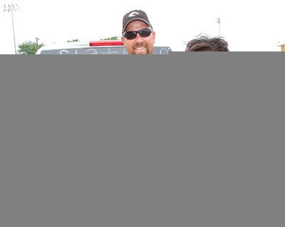 Image: IHS Athletic Director, Hank Hollywood, prepares to make the trip to Austin with Lady Gladiators, Jameka Copeland and Kortnei Johnson.