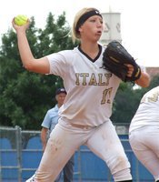 Image: Senior Lady Gladiator pitcher, Megan Richards(17), throws to first base for an out.