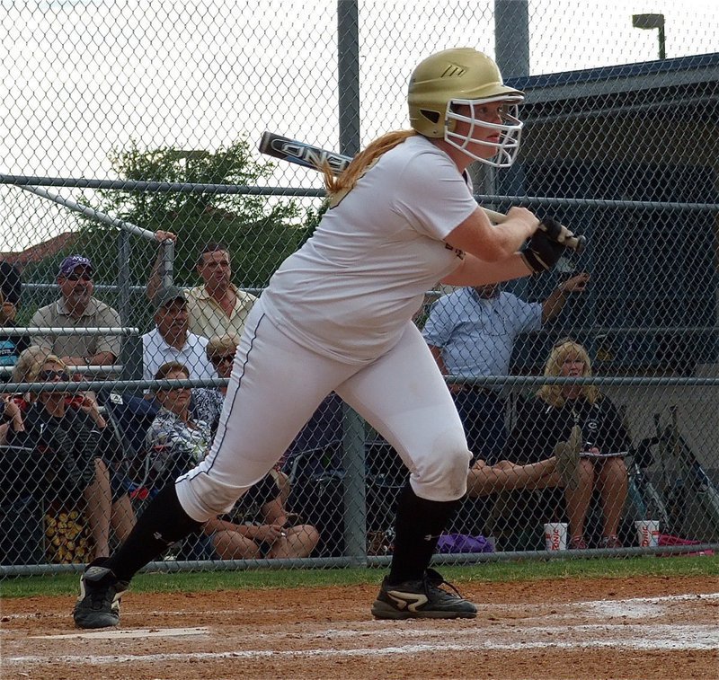 Image: Italy’s, Katie Byers(13), puts the ball into play against Crawford.