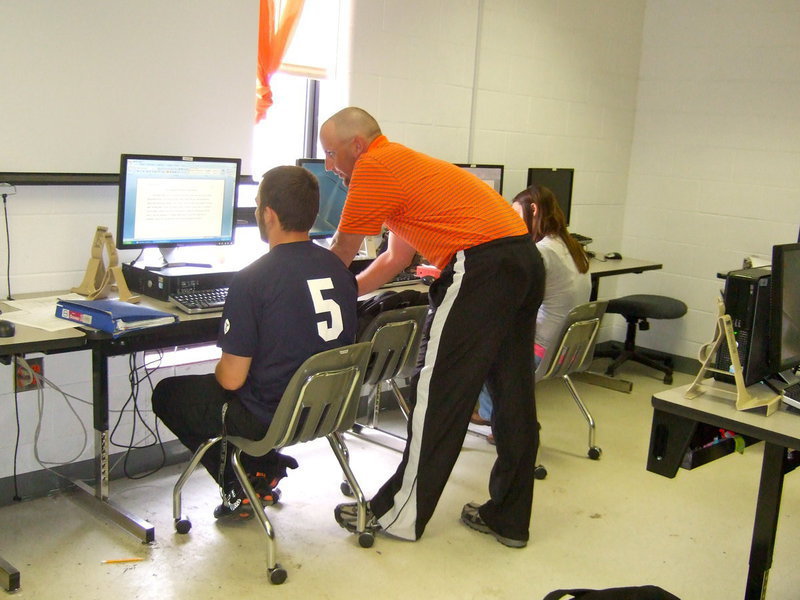 Image: Malcolm Cole teaches Business and Business Management II.