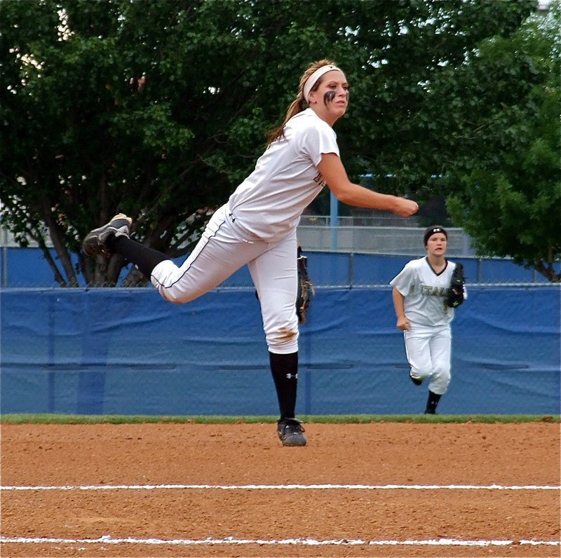 Image: Senior shortstop, Bailey Bumpus(18), makes the play and throws for the out against Crawford.