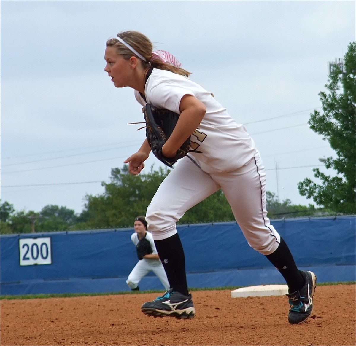 Image: Second baseman, Bailey Eubank(11) hustles over to cover first base.