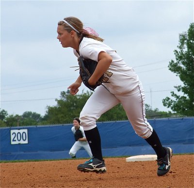 Image: Second baseman, Bailey Eubank(11) hustles over to cover first base.