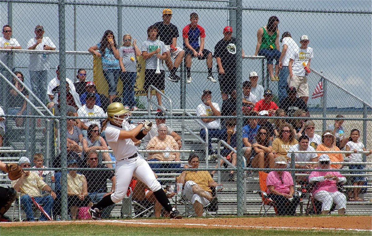 Image: Jaclynn Lewis(15) gets another hit for the Lady Gladiators.