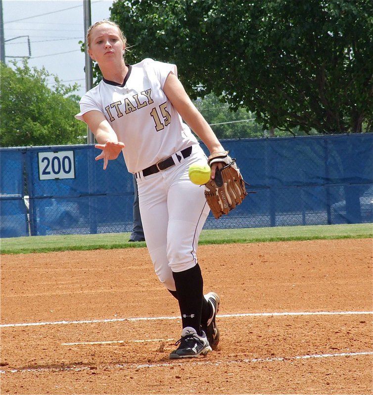 Image: Jaclynn Lewis(15) takes the mound in game 2 against Crawford and the freshman slinger handled the playoff pressure valiantly.