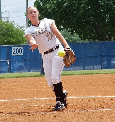 Image: Jaclynn Lewis(15) takes the mound in game 2 against Crawford and the freshman slinger handled the playoff pressure valiantly.