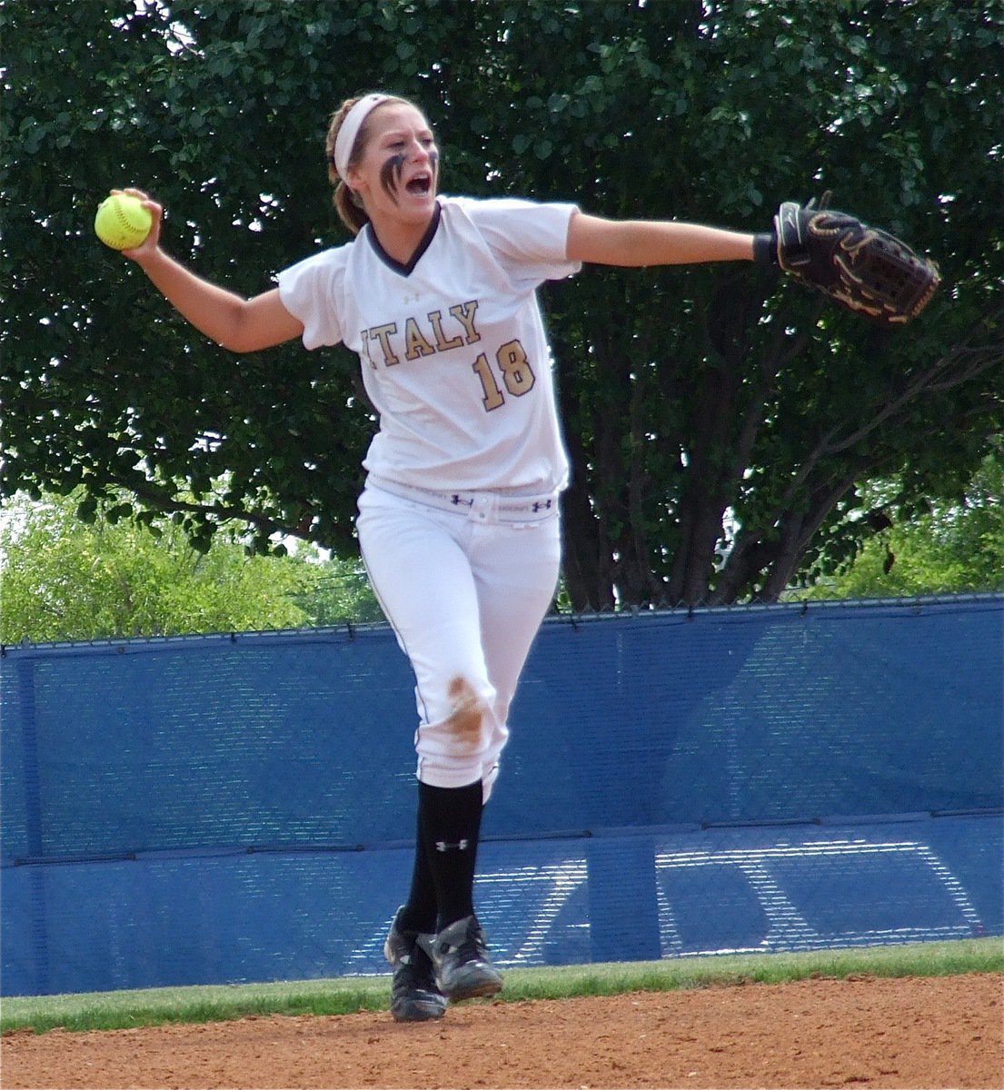 Image: Senior shortstop, Bailey Bumpus(18) lets out a batlle cry!