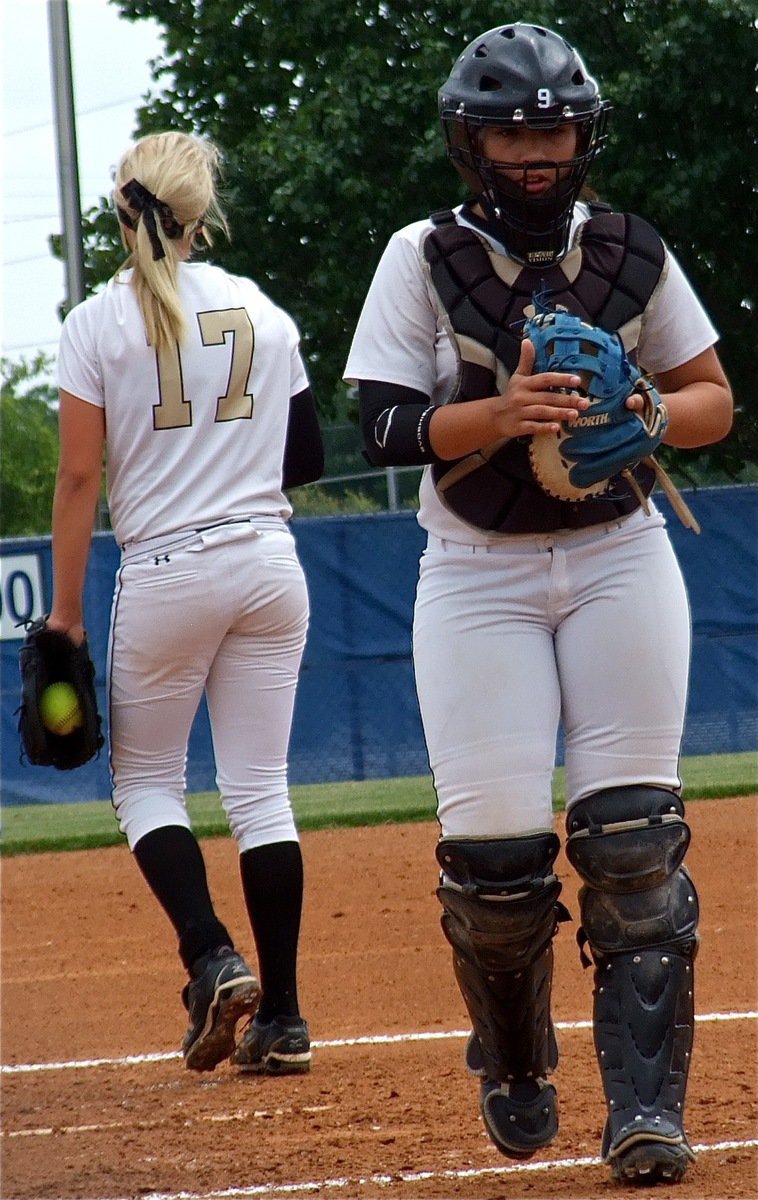 Image: Megan Richards(17) and her little sister, Alyssa Richards(9), team for the last time as Lady Gladiator teammates.