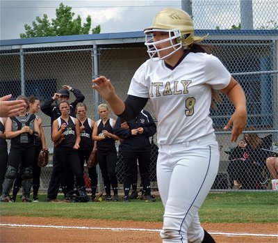 Image: With 9 homeruns to her credit this season, Alyssa Richards(9) gets introduced with the Lady Pirates taking notice.