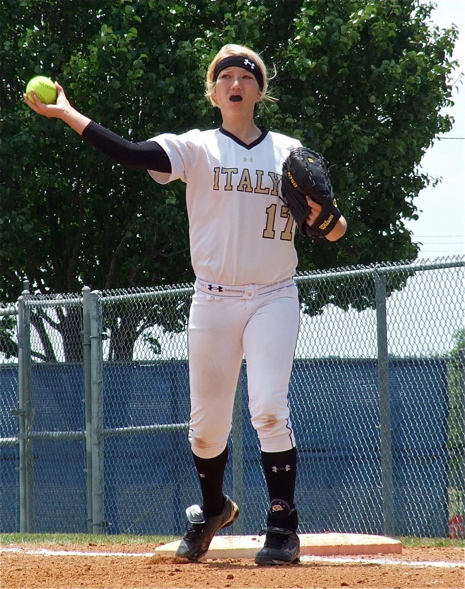 Image: Versatile, Megan Richards(17) handles the first base duties for a while during game 2.