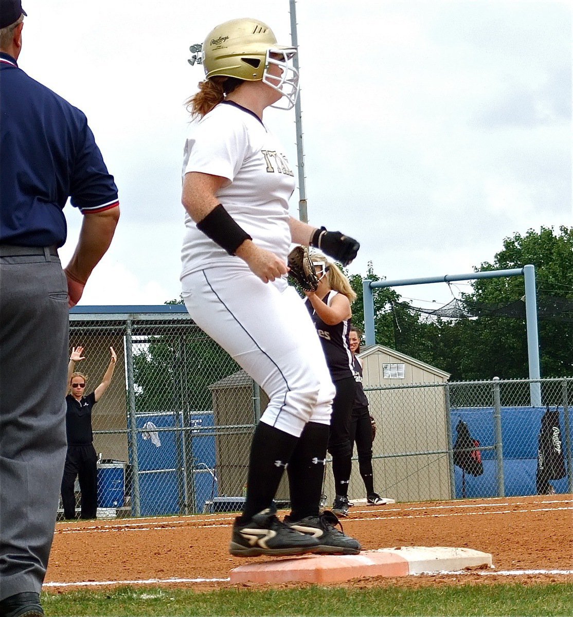 Image: Katie Byers(13), a junior, singles to first base for the Lady Gladiators.