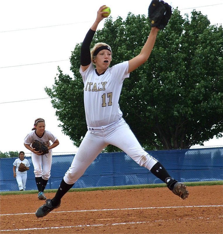 Image: Megan Richards(17) is back on the mound to finish the game with second baseman Bailey Eubank(11) and right fielder Alma Suaste(7) backing her up.