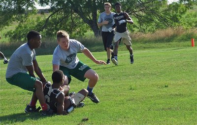 Image: Trevon Robertson gets low to make the catch.
