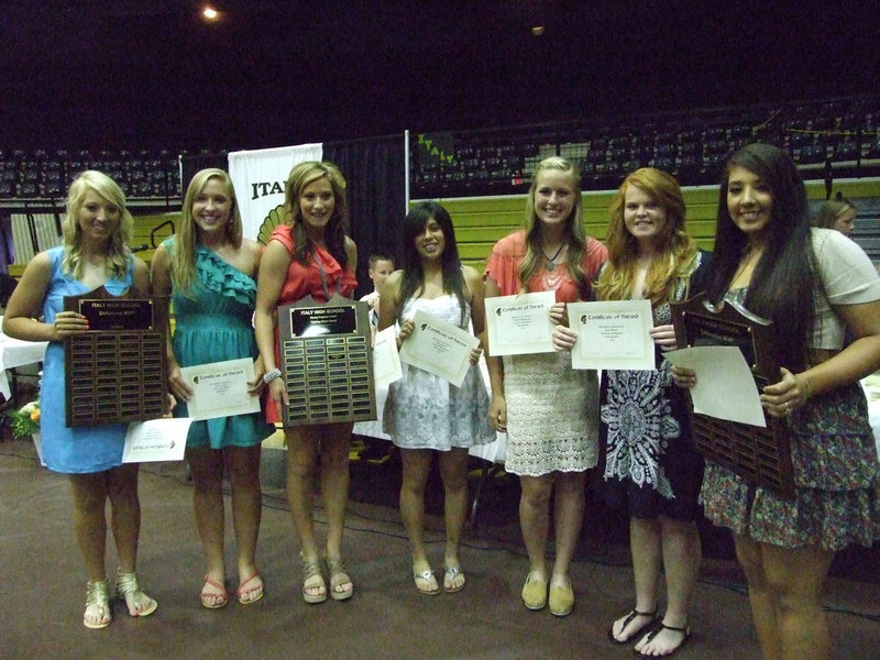 Image: Girls softball district award winners:(L-R) Megan Richards, Jaclynn Lewis, Bailey Bumpus, Alma Suaste, Maddie Washington, Katie Byers and Alyssa Richards.