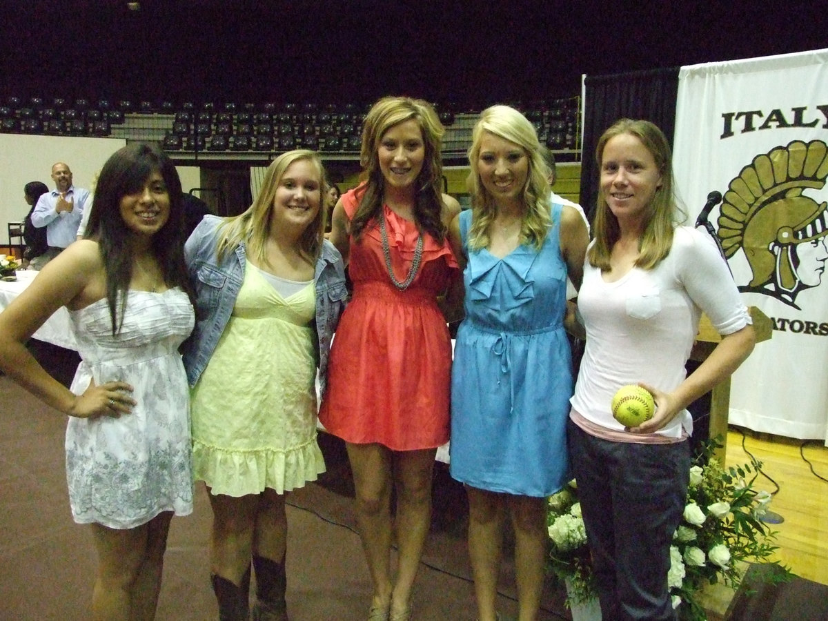 Image: Coach Jennifer Reeves was awarded a ball by the senior team members.